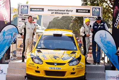 2;17-July-2011;2;APRC;Asia-Pacific-Rally-Championship;Chris-Atkinson;International-Rally-Of-Whangarei;NZ;New-Zealand;Northland;Proton;Proton-Motorsports;Proton-Satria-Neo-S2000;Rally;Stephane-Prevot;Whangarei;auto;garage;motorsport;podium;racing;telephoto