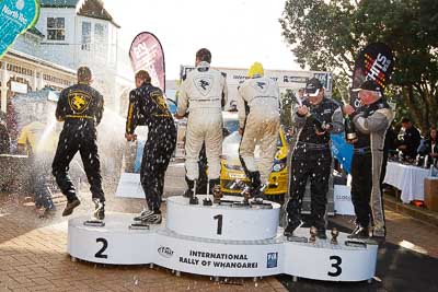 17-July-2011;APRC;Alister-McRae;Asia-Pacific-Rally-Championship;Bill-Hayes;Brian-Green;Chris-Atkinson;Fleur-Pedersen;International-Rally-Of-Whangarei;NZ;New-Zealand;Northland;Rally;Stephane-Prevot;Whangarei;auto;champagne;garage;motorsport;podium;racing;wide-angle