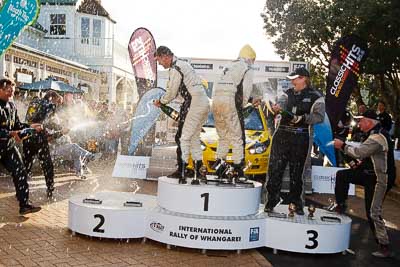 17-July-2011;APRC;Alister-McRae;Asia-Pacific-Rally-Championship;Bill-Hayes;Brian-Green;Chris-Atkinson;Fleur-Pedersen;International-Rally-Of-Whangarei;NZ;New-Zealand;Northland;Rally;Stephane-Prevot;Whangarei;auto;champagne;garage;motorsport;podium;racing;wide-angle