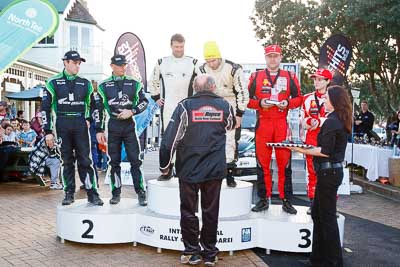 17-July-2011;APRC;Asia-Pacific-Rally-Championship;Chris-Atkinson;Hayden-Paddon;International-Rally-Of-Whangarei;John-Kennard;NZ;New-Zealand;Northland;Rally;Richard-Mason;Sara-Mason;Stephane-Prevot;Whangarei;auto;garage;motorsport;podium;racing;wide-angle