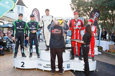 17-July-2011;APRC;Asia-Pacific-Rally-Championship;Chris-Atkinson;Hayden-Paddon;International-Rally-Of-Whangarei;John-Kennard;NZ;New-Zealand;Northland;Rally;Richard-Mason;Sara-Mason;Stephane-Prevot;Whangarei;auto;garage;motorsport;podium;racing;wide-angle