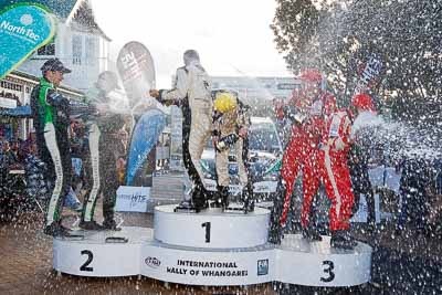 17-July-2011;APRC;Asia-Pacific-Rally-Championship;Chris-Atkinson;Hayden-Paddon;International-Rally-Of-Whangarei;John-Kennard;NZ;New-Zealand;Northland;Rally;Richard-Mason;Sara-Mason;Stephane-Prevot;Whangarei;auto;garage;motorsport;podium;racing;wide-angle