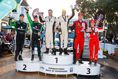 17-July-2011;APRC;Asia-Pacific-Rally-Championship;Chris-Atkinson;Hayden-Paddon;International-Rally-Of-Whangarei;John-Kennard;NZ;New-Zealand;Northland;Rally;Richard-Mason;Sara-Mason;Stephane-Prevot;Topshot;Whangarei;auto;garage;motorsport;podium;racing;wide-angle