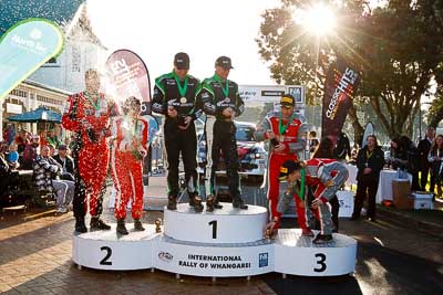 17-July-2011;APRC;Asia-Pacific-Rally-Championship;Chris-West;Erin-Kyle;Hayden-Paddon;International-Rally-Of-Whangarei;John-Kennard;NZ;New-Zealand;Northland;Rally;Richard-Mason;Sara-Mason;Whangarei;auto;champagne;garage;motorsport;podium;racing;wide-angle