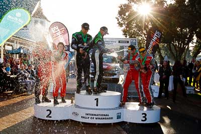 17-July-2011;APRC;Asia-Pacific-Rally-Championship;Chris-West;Erin-Kyle;Hayden-Paddon;International-Rally-Of-Whangarei;John-Kennard;NZ;New-Zealand;Northland;Rally;Richard-Mason;Sara-Mason;Whangarei;auto;champagne;garage;motorsport;podium;racing;wide-angle