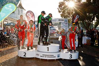 17-July-2011;APRC;Asia-Pacific-Rally-Championship;Chris-West;Erin-Kyle;Hayden-Paddon;International-Rally-Of-Whangarei;John-Kennard;NZ;New-Zealand;Northland;Rally;Richard-Mason;Sara-Mason;Whangarei;auto;champagne;garage;motorsport;podium;racing;wide-angle