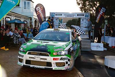 28;17-July-2011;APRC;Asia-Pacific-Rally-Championship;International-Rally-Of-Whangarei;John-Allen;Kingsley-Thompson;Mitsubishi-Lancer-Evolution-X;NZ;New-Zealand;Northland;Rally;Whangarei;auto;garage;motorsport;podium;racing;wide-angle