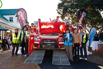 19;17-July-2011;19;APRC;Asia-Pacific-Rally-Championship;Fan-Fan;International-Rally-Of-Whangarei;Junwei-Fang;Mitsubishi-Lancer-Evolution-X;NZ;New-Zealand;Northland;Rally;Soueast-Motor-Kumho-Team;Whangarei;auto;garage;motorsport;podium;racing;wide-angle