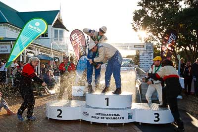 17-July-2011;APRC;Asia-Pacific-Rally-Championship;Ben-Hunt;International-Rally-Of-Whangarei;Josh-Marston;NZ;New-Zealand;Northland;Phil-Campbell;Rally;Sarah-Coatsworth;Tony-Rawstorn;Venita-Fabbro;Whangarei;auto;champagne;garage;motorsport;podium;racing;wide-angle