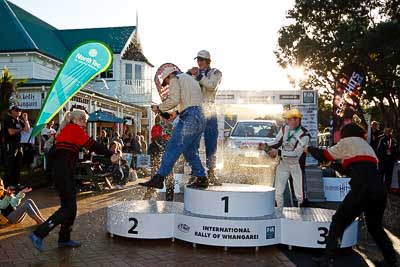 17-July-2011;APRC;Asia-Pacific-Rally-Championship;Ben-Hunt;International-Rally-Of-Whangarei;Josh-Marston;NZ;New-Zealand;Northland;Phil-Campbell;Rally;Sarah-Coatsworth;Tony-Rawstorn;Venita-Fabbro;Whangarei;auto;champagne;garage;motorsport;podium;racing;wide-angle