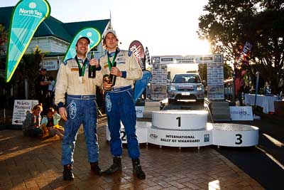 17-July-2011;APRC;Asia-Pacific-Rally-Championship;Ben-Hunt;International-Rally-Of-Whangarei;NZ;New-Zealand;Northland;Rally;Tony-Rawstorn;Whangarei;auto;champagne;garage;motorsport;podium;racing;wide-angle