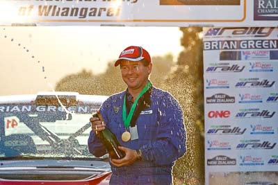 17-July-2011;APRC;Asia-Pacific-Rally-Championship;International-Rally-Of-Whangarei;NZ;New-Zealand;Northland;Phillip-Deakin;Rally;Whangarei;auto;champagne;garage;motorsport;podium;racing;telephoto