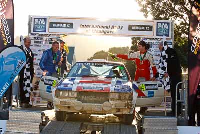 59;17-July-2011;APRC;Asia-Pacific-Rally-Championship;Deborah-Kibble;International-Rally-Of-Whangarei;NZ;New-Zealand;Nissan-240RS;Northland;Rally;Rob-Wylie;Whangarei;auto;garage;motorsport;podium;racing;telephoto