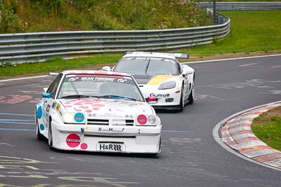 599;30-July-2011;Bernhard-Schmittner;Deutschland;Germany;Green-Hell;Grüne-Hölle;Hans‒Olaf-Beckmann;Hatzenbach;Kissling-Motorsport;Langstreckenmeisterschaft;Nordschleife;Nuerburg;Nuerburgring;Nurburg;Nurburgring;Nürburg;Nürburgring;Opel-Manta;Peter-Hass;Rhineland‒Palatinate;VLN;auto;championship;endurance;motorsport;racing;telephoto