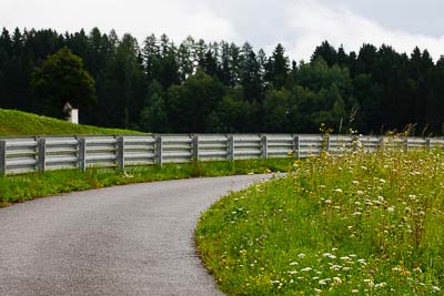 13-August-2011;ADAC-Masters;Austria;Red-Bull-Ring;Spielberg;Styria;atmosphere;auto;barrier;circuit;guard-rail;landscape;motorsport;path;racing;scenery;telephoto;track;trees;Österreich