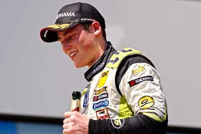 14-August-2011;ADAC-Masters;ATS-Formel-3-Cup;Austria;Formula-3;Open-Wheeler;Red-Bull-Ring;Richie-Stanaway;Spielberg;Styria;atmosphere;auto;celebration;champagne;circuit;motorsport;podium;portrait;racing;super-telephoto;track;Österreich