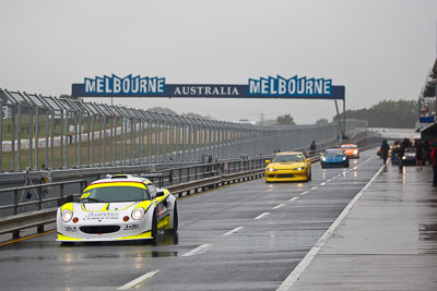 99;26-November-2011;Australia;Garth-Walden;Island-Magic;Lotus-Sport-200;Melbourne;PIARC;Peter-Lucas;Phillip-Island;Production-Sports-Cars;VIC;Victoria;atmosphere;auto;motorsport;pitlane;racing;telephoto