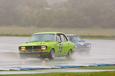 31;26-November-2011;31;Australia;Ben-Read;Historic-Touring-Cars;Island-Magic;Mazda-RX‒2;Melbourne;PIARC;Phillip-Island;VIC;Victoria;auto;classic;motorsport;racing;rain;super-telephoto;vintage;wet