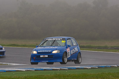 50;26-November-2011;Australia;David-Loftus;Improved-Production;Island-Magic;Melbourne;PIARC;Phillip-Island;Toyota-Starlet;VIC;Victoria;auto;motorsport;racing;rain;super-telephoto;wet