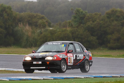 3;26-November-2011;3;Australia;Geoffrey-Fear;Improved-Production;Island-Magic;Melbourne;Nissan-Pulsar-N14;PIARC;Phillip-Island;VIC;Victoria;auto;motorsport;racing;rain;super-telephoto;wet