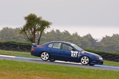 13;13;26-November-2011;Australia;Bronson-Butcher;Ford-Falcon-AU;Improved-Production;Island-Magic;Melbourne;PIARC;Phillip-Island;VIC;Victoria;auto;motorsport;racing;rain;super-telephoto;wet