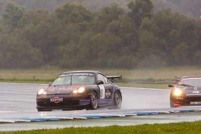 3;26-November-2011;3;Australia;Island-Magic;Mathew-Turnbull;Melbourne;Michael-Garner;PIARC;Phillip-Island;Porsche-911-GT3-Cup-996;Production-Sports-Cars;VIC;Victoria;auto;motorsport;racing;rain;super-telephoto;wet