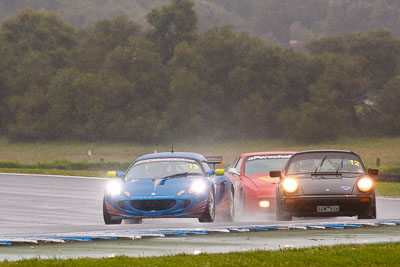 73;26-November-2011;73;Australia;Glenn-Townsend;Island-Magic;Lotus-Elise;Melbourne;PIARC;Phillip-Island;Production-Sports-Cars;Tim-Mackie;VIC;Victoria;auto;motorsport;racing;rain;super-telephoto;wet