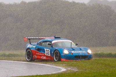 32;26-November-2011;Australia;David-Mackie;Island-Magic;Lotus-Elise-HPE;Melbourne;PIARC;Phillip-Island;Production-Sports-Cars;Simon-Scuffham;VIC;Victoria;auto;motorsport;racing;rain;super-telephoto;wet