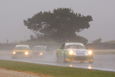 57;26-November-2011;57;Australia;Improved-Production;Island-Magic;John-Perkins;Mazda-RX‒7;Mazda-RX7;Melbourne;PIARC;Phillip-Island;VIC;Victoria;auto;motorsport;racing;rain;super-telephoto;wet