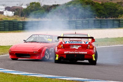 4;42;27-November-2011;4;Australia;Holden-Monaro;Improved-Production;Island-Magic;Leanne-Tander;Matt-Cherry;Mazda-RX‒7;Mazda-RX7;Melbourne;PIARC;Phillip-Island;VIC;Victoria;auto;motorsport;racing;super-telephoto