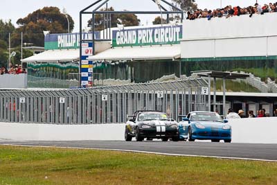 11;98;11;27-November-2011;Australia;Graham-Gorman;Island-Magic;Matilda-Mravicic;Matthew-Stoupas;Mazda-MX‒5;Mazda-MX5;Mazda-Miata;Melbourne;Nick-Martinenko;PIARC;Phillip-Island;Porsche-911-GT3-Cup-996;Production-Sports-Cars;VIC;Victoria;auto;motorsport;racing;super-telephoto