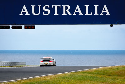 1;1;27-November-2011;Australia;Island-Magic;Melbourne;Neale-Muston;PIARC;Phillip-Island;Porsche-911-GT3-Cup-997;Production-Sports-Cars;VIC;Victoria;auto;motorsport;racing;sky;super-telephoto