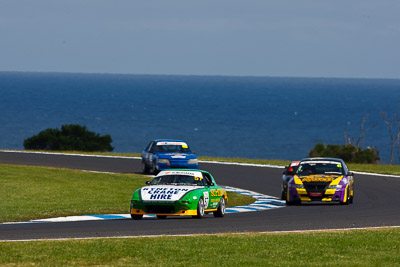 57;27-November-2011;57;Australia;Improved-Production;Island-Magic;John-Perkins;Mazda-RX‒7;Mazda-RX7;Melbourne;PIARC;Phillip-Island;VIC;Victoria;auto;motorsport;racing;scenery;sky;super-telephoto