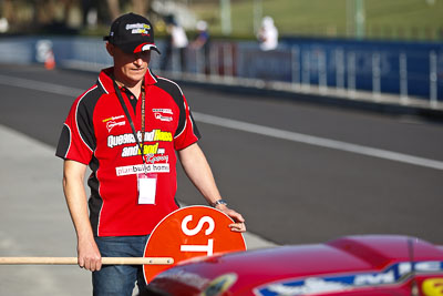 24-February-2012;Australia;Bathurst;Bathurst-12-Hour;Mt-Panorama;NSW;New-South-Wales;Robert-Thomson;atmosphere;auto;endurance;motorsport;paddock;pitlane;portrait;racing;telephoto