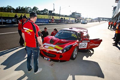 62;24-February-2012;62;Australia;Bathurst;Bathurst-12-Hour;Christian-Klien;Lotus-Exige-S;Mt-Panorama;NSW;New-South-Wales;Robert-Thomson;Sarah-Harley;atmosphere;auto;endurance;motorsport;pitlane;racing;wide-angle