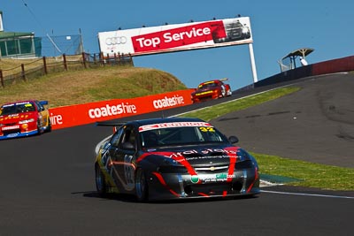 32;24-February-2012;Australia;Bathurst;Bathurst-12-Hour;Holden-Monaro;Michael-Robinson;Mt-Panorama;NSW;New-South-Wales;Sports-Sedans;auto;endurance;motorsport;racing;telephoto