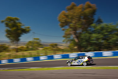 26;24-February-2012;26;Angus-Chapel;Australia;BMW-130i;Bathurst;Bathurst-12-Hour;GWS-Personnel-Motorsport;Mt-Panorama;NSW;New-South-Wales;Richard-Gartner;Tony-Prior;auto;endurance;motion-blur;motorsport;racing;sky;wide-angle