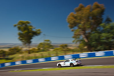 35;24-February-2012;35;Andrew-Bollom;Australia;Bathurst;Bathurst-12-Hour;Duvashen-Padayachee;James-Parish;Mazda-RX‒7;Mazda-RX7;Mt-Panorama;NSW;New-South-Wales;Phil-Alexander;auto;endurance;motion-blur;motorsport;racing;sky;wide-angle