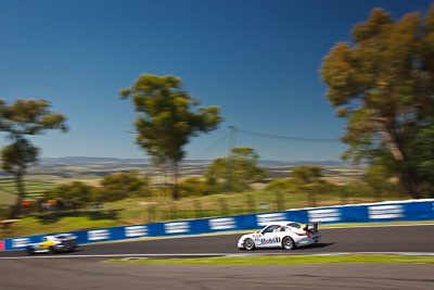 65;24-February-2012;65;Australia;Bathurst;Bathurst-12-Hour;Brett-Niall;Motorsport-Services;Mt-Panorama;NSW;New-South-Wales;Porsche-911-GT3-Cup-997;Scott-ODonnell;Simon-McLennon;auto;endurance;motion-blur;motorsport;racing;sky;wide-angle