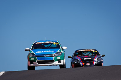 50;24-February-2012;Australia;Bathurst;Bathurst-12-Hour;Chris-Pither;Elliot-Barbour;Holden-HSV-VXR;Mt-Panorama;NSW;New-South-Wales;Racer-Industries;Scott-Pye;auto;endurance;motorsport;racing;sky;super-telephoto