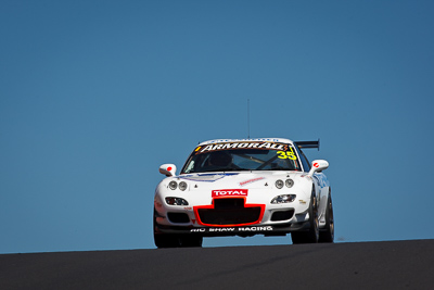 35;24-February-2012;35;Andrew-Bollom;Australia;Bathurst;Bathurst-12-Hour;Duvashen-Padayachee;James-Parish;Mazda-RX‒7;Mazda-RX7;Mt-Panorama;NSW;New-South-Wales;Phil-Alexander;auto;endurance;motorsport;racing;sky;super-telephoto