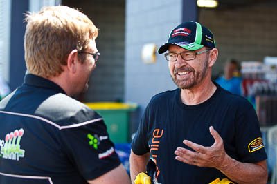 24-February-2012;Australia;Bathurst;Bathurst-12-Hour;John-Bowe;Maranello-Motorsport;Mt-Panorama;NSW;New-South-Wales;atmosphere;auto;endurance;motorsport;paddock;pitlane;portrait;racing;telephoto