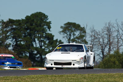 57;24-February-2012;57;Australia;Bathurst;Bathurst-12-Hour;Frank-Mascadri;Mazda-RX‒7;Mazda-RX7;Mt-Panorama;NSW;New-South-Wales;Sports-Sedans;auto;endurance;motorsport;racing;super-telephoto