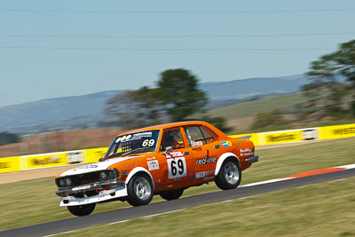 69;24-February-2012;69;Australia;Bathurst;Bathurst-12-Hour;Graeme-Shea;Improved-Production;Mazda-Capella;Mt-Panorama;NSW;New-South-Wales;auto;endurance;motion-blur;motorsport;racing;telephoto