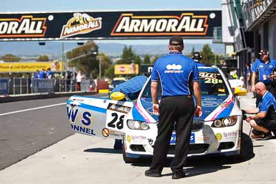 28;24-February-2012;Australia;BMW-335i;Bathurst;Bathurst-12-Hour;Christian-DAgostin;GWS-Personnel-Motorsport;Garth-Duffy;Mt-Panorama;NSW;New-South-Wales;Peter-ODonnell;atmosphere;auto;endurance;motorsport;pitlane;racing;telephoto