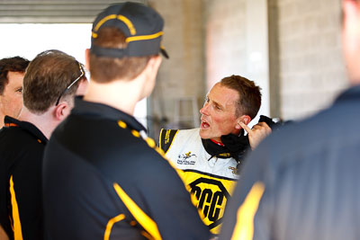 24-February-2012;Australia;Bathurst;Bathurst-12-Hour;Cameron-McConville;Mt-Panorama;NSW;New-South-Wales;atmosphere;auto;endurance;motorsport;paddock;pitlane;portrait;racing;telephoto