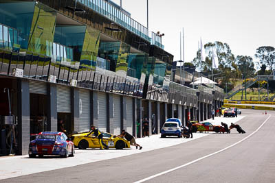 3;4;24-February-2012;3;4;Australia;Bathurst;Bathurst-12-Hour;Cameron-McConville;Consolidated-Chemicals;Hunter-Sports-Group;Lamborghini-Gallardo-LP560;Luke-Searle;Mt-Panorama;NSW;Nathan-Tinkler;New-South-Wales;Peter-Kox;Porsche-911-GT3-Cup-997;Steven-Johnson;Steven-Richards;Ted-Huglin;Tinkler-Motorsports;atmosphere;auto;endurance;motorsport;pitlane;racing;telephoto