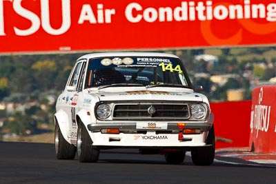 144;24-February-2012;Andrew-Cherni;Australia;Bathurst;Bathurst-12-Hour;Datsun-1200;Improved-Production;Mt-Panorama;NSW;New-South-Wales;auto;endurance;motorsport;racing;super-telephoto