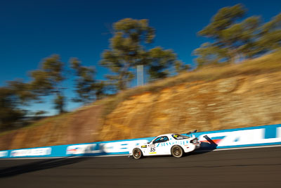 35;25-February-2012;35;Andrew-Bollom;Australia;Bathurst;Bathurst-12-Hour;Duvashen-Padayachee;James-Parish;Mazda-RX‒7;Mazda-RX7;Mt-Panorama;NSW;New-South-Wales;Phil-Alexander;auto;endurance;motion-blur;motorsport;racing;wide-angle