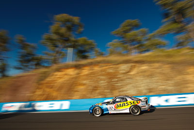 32;25-February-2012;Australia;Bathurst;Bathurst-12-Hour;Gerry-Murphy;Jim-Pollicina;Mazda-RX‒7;Mazda-RX7;Michael-Caine;Mt-Panorama;NSW;New-South-Wales;auto;endurance;motion-blur;motorsport;racing;wide-angle